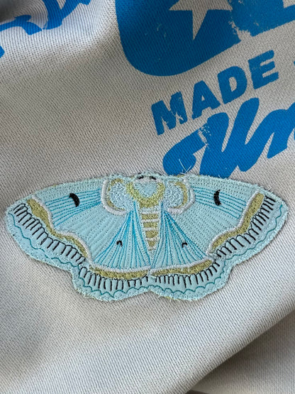 BLUE MOTH